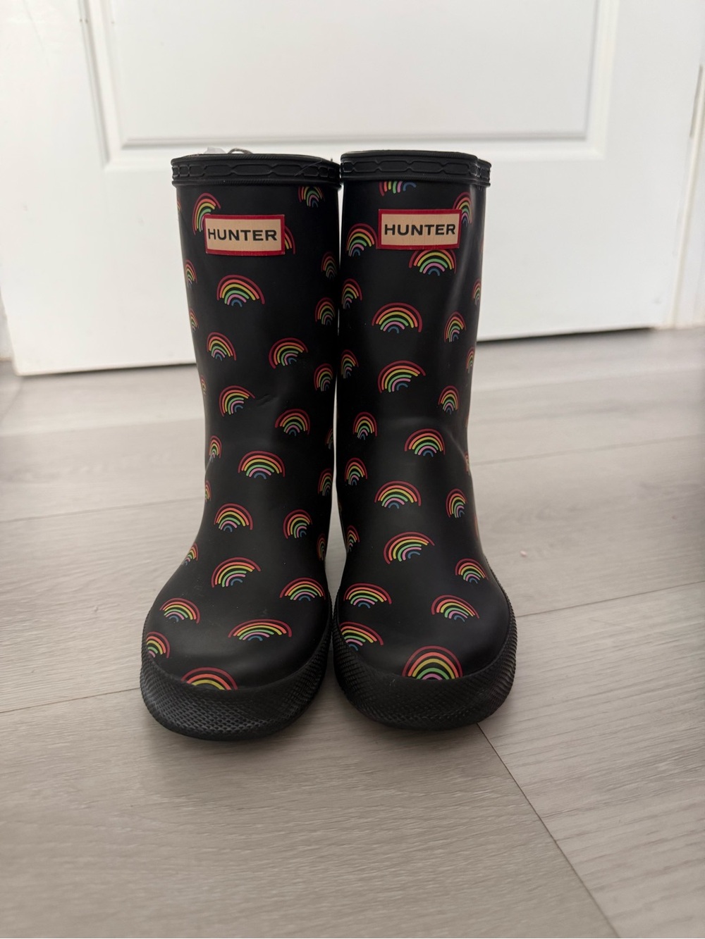 Hunter Kids Black Rain Boots with Multicolor Rainbow Print